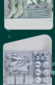 Detail of mint green and silver Christmas ball ornaments in transparent packaging box
