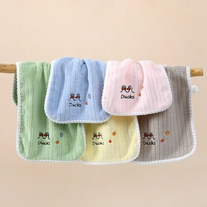 Five soft hanging towels for kids with cute duck embroidery in pastel colors