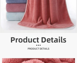 Detailed close-up of thick coral fleece bath towels with lattice texture in pastel colors