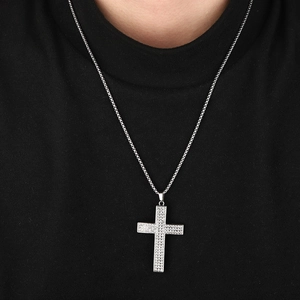 Silver iced out cross necklace with box chain for men and women on black background