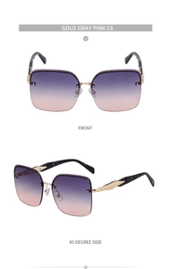 Detailed front and side views of oversized gradient lenses with gold metal frames
