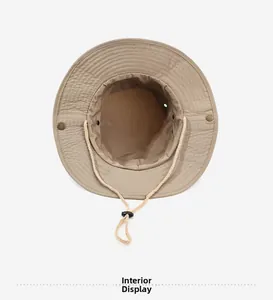 Interior details of khaki fishing hat featuring breathable mesh lining and windproof cord