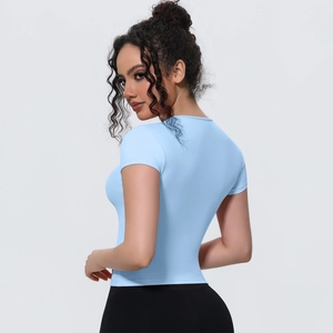 Detailed back view showing the slim fit and high-elasticity fabric of light blue yoga top