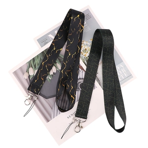Detail of marble and geometric pattern neck lanyards with durable metal swivel hooks