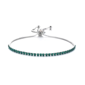 Detail of S925 sterling silver adjustable tennis bracelet with green zircon stones