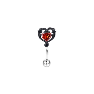 Macro shot of gothic black heart frame with red zircon stone on silver curved eyebrow piercing