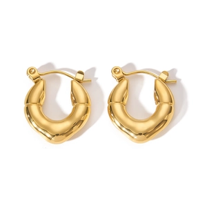 Vintage irregular golden U-shaped bamboo style stainless steel earrings on white background