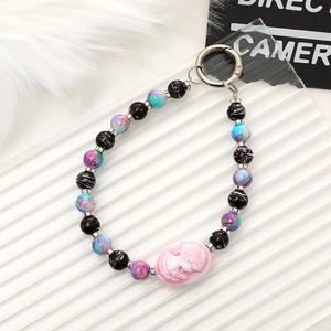 Creative glass beaded phone strap with pink cameo pendant and sparkling rhinestones