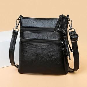 Classic black leather crossbody phone bag with multi-layer zippers and adjustable strap