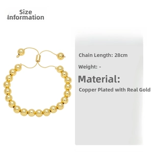 Detail of adjustable 18K gold-plated copper bead bracelet with 28cm length dimension