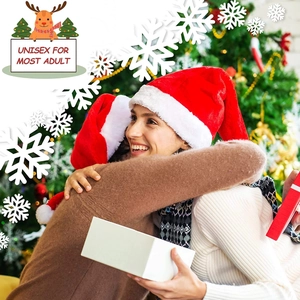 Classic red plush Christmas hat with white fur trim worn by a happy couple near a festive tree