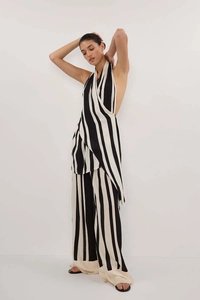 Detailed view of striped halter top and wide-leg trousers set in premium woven fabric