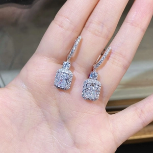 Elegant 925 sterling silver drop earrings with 2 carat radiant cut sparkling diamonds