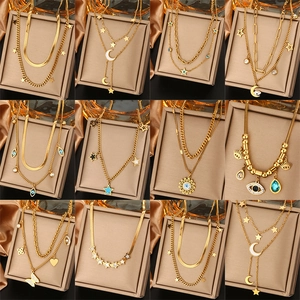 Collier Double Couche en Acier Inoxydable pour Femme Plaqué Or 18K Mauvais Œil Étoile Lune Papillon Strass Bijoux