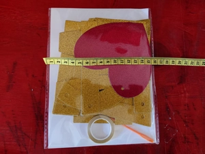 DIY gold and red glitter heart banner kit with threading needle and clear adhesive tape