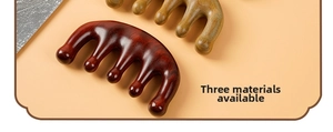 Detailed view of polished sandalwood scalp massage combs showing smooth grain and round teeth