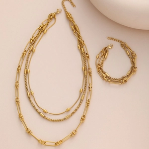 Elegant gold double-layered bamboo chain necklace and bracelet set with geometric links
