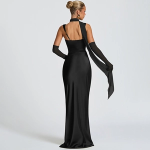 Elegant backless black satin evening gown with floor-length hem and lace gloves detail