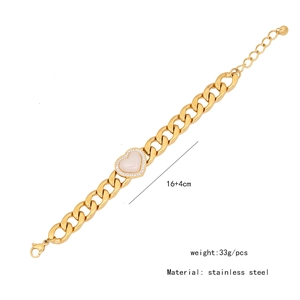 Detail showing a gold heart charm bracelet with green stones and dimensions 16+4cm