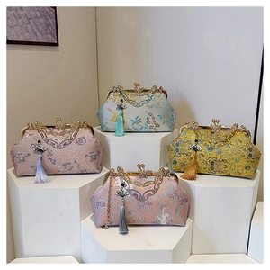 Elegant embroidered evening clutches with silk tassels and gold-tone kiss-lock frames