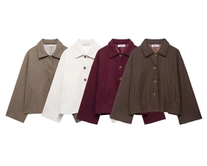 Macro view of four-color loose woolen coats featuring classic lapels and buttons