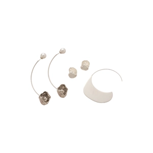 Minimalist silver petal tassel earring set with pearls on a clean white background