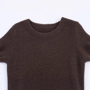 Brown knitted dress with a round neck and luxury faux fur texture details