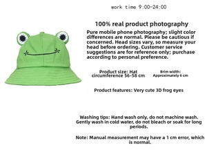 Detail of green cotton frog bucket hat showing cute 3D eyes and 56-58cm head circumference