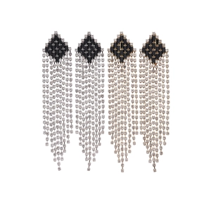 Elegant rhinestone tassel earrings with black diamond rhombi and silver fringe dangles