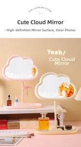 Detail of cute cloud-shaped makeup mirror with star charms and organized storage tray