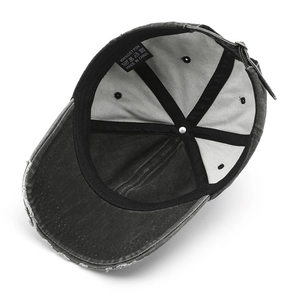Internal view of grey washed cotton baseball cap with sweatband and cotton care label