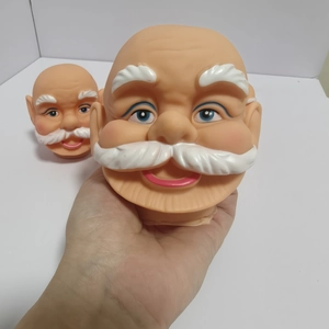 DIY 3D vinyl Santa Claus head ornaments with white beard and blue eyes for Christmas decor