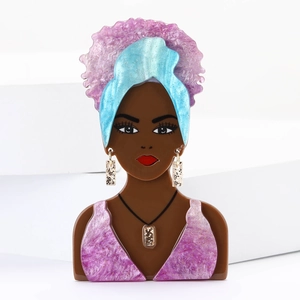 Artistic acrylic African woman brooch with glitter hair and blue turban on white steps