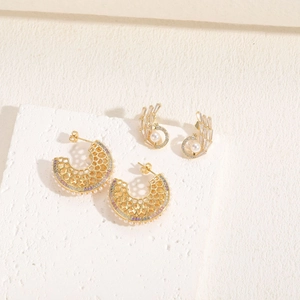 Luxurious 14K gold plated earrings with honeycomb zircon hoops and pearl feather drops