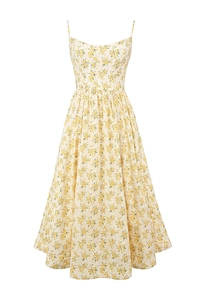 Detail of floral spaghetti strap midi dress showing yellow print on cream fabric