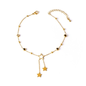Gold star ankle bracelet with black white zircon charms and tassel stars on white background