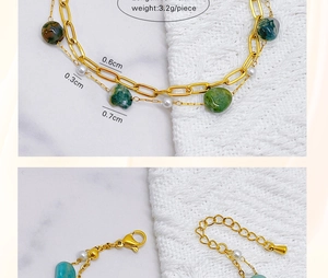 Detail view of gold double-layer bracelet with green stones and pearls showing dimensions