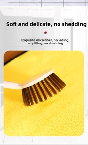 Detail view of thickened yellow microfiber cleaning cloth with soft dense bristles brush