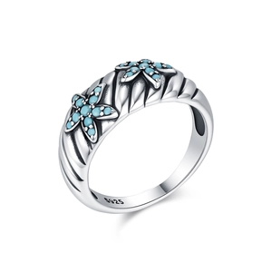 Vintage S925 sterling silver starfish ring featuring turquoise accents and floral details