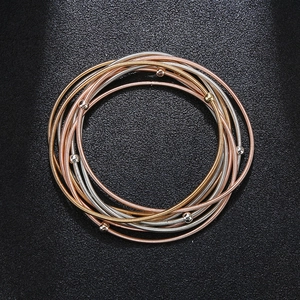 Classic 1.7mm colorful layered metal spring bracelets with small beads in gold and silver
