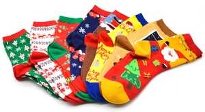 Close-up of assorted cotton Christmas socks with Santa, reindeer and tree patterns