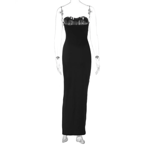 Detail of a chic French black strapless maxi dress with slimming pleated ribbon design