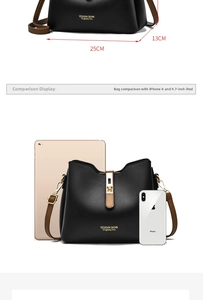 Size comparison of black leather handbag with 9.7-inch iPad and iPhone X dimensions