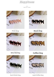 Detail view of various cat-shaped hair clips in six different colors on display cards