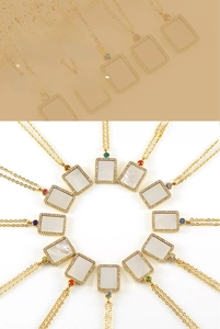 Macro shot of twelve monthly birthstone necklaces with gold-plated shell pendants and zircons