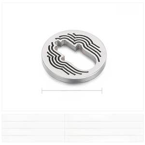 Detail of 16mm Hamsa Hand stainless steel charm with intricate cutout and shell inlay