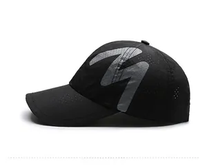 Detail view of the breathable mesh fabric and reflective print on this black baseball cap
