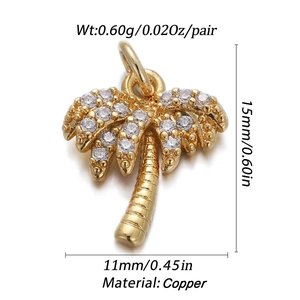 Macro view of gold palm tree pendant with cubic zirconia and exact dimensions
