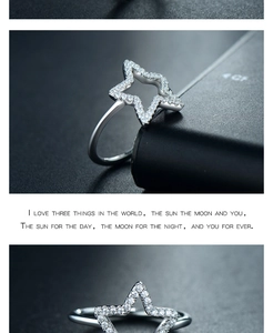 Macro shot of S925 sterling silver hollow star ring with micro-set crystals and romantic quote