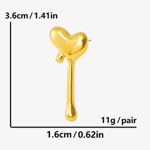 Macro shot of gold liquid heart stud earrings with detailed dimensions and weight